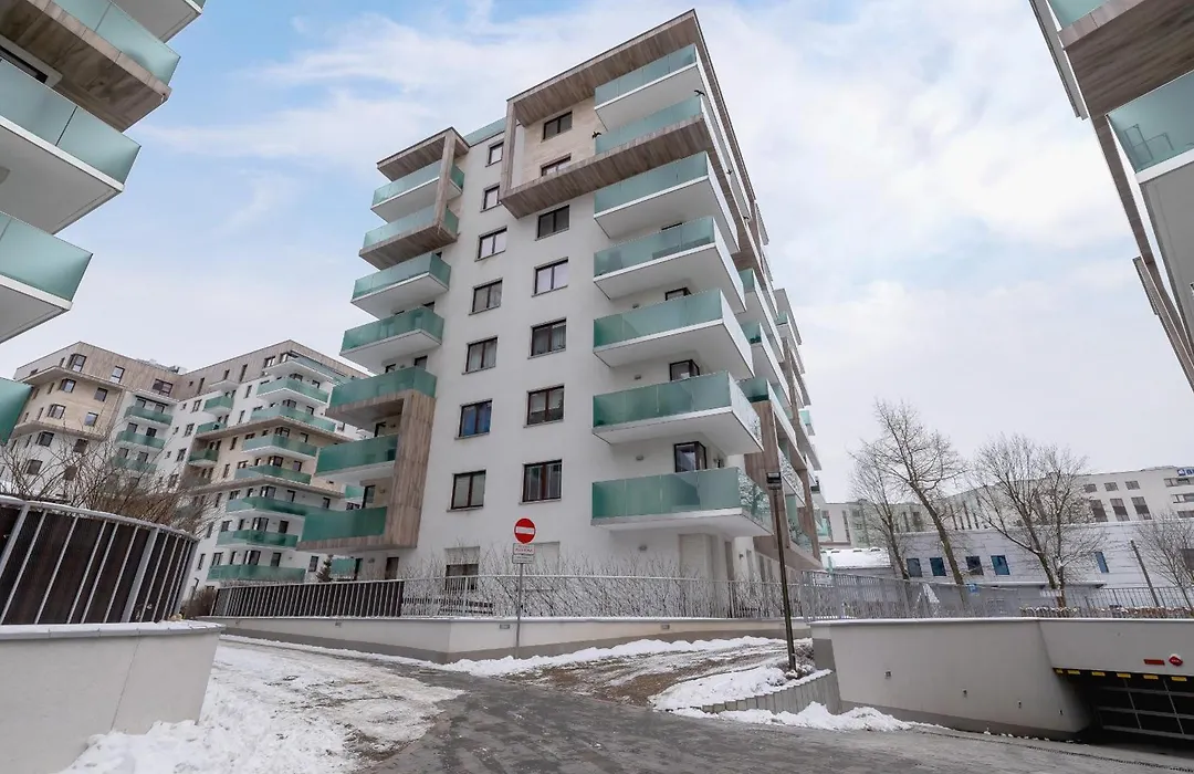 Subtle Grey Apartment With Furnished Balcony And Parking In Krakow By Noclegi Renters-1
